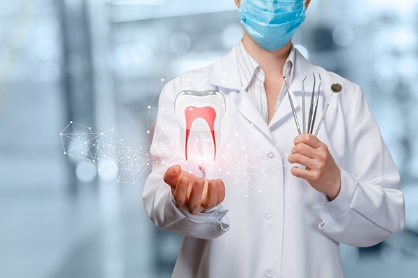 Why You Should See A Periodontist For Dental Implants